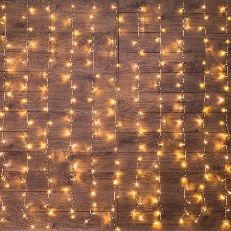 Гирлянда светодиодная "Светодиодный Дождь" 2х2.5м 300LED тепл. бел. 18Вт 230В IP20 свечение с динамикой провод прозр. 235-056