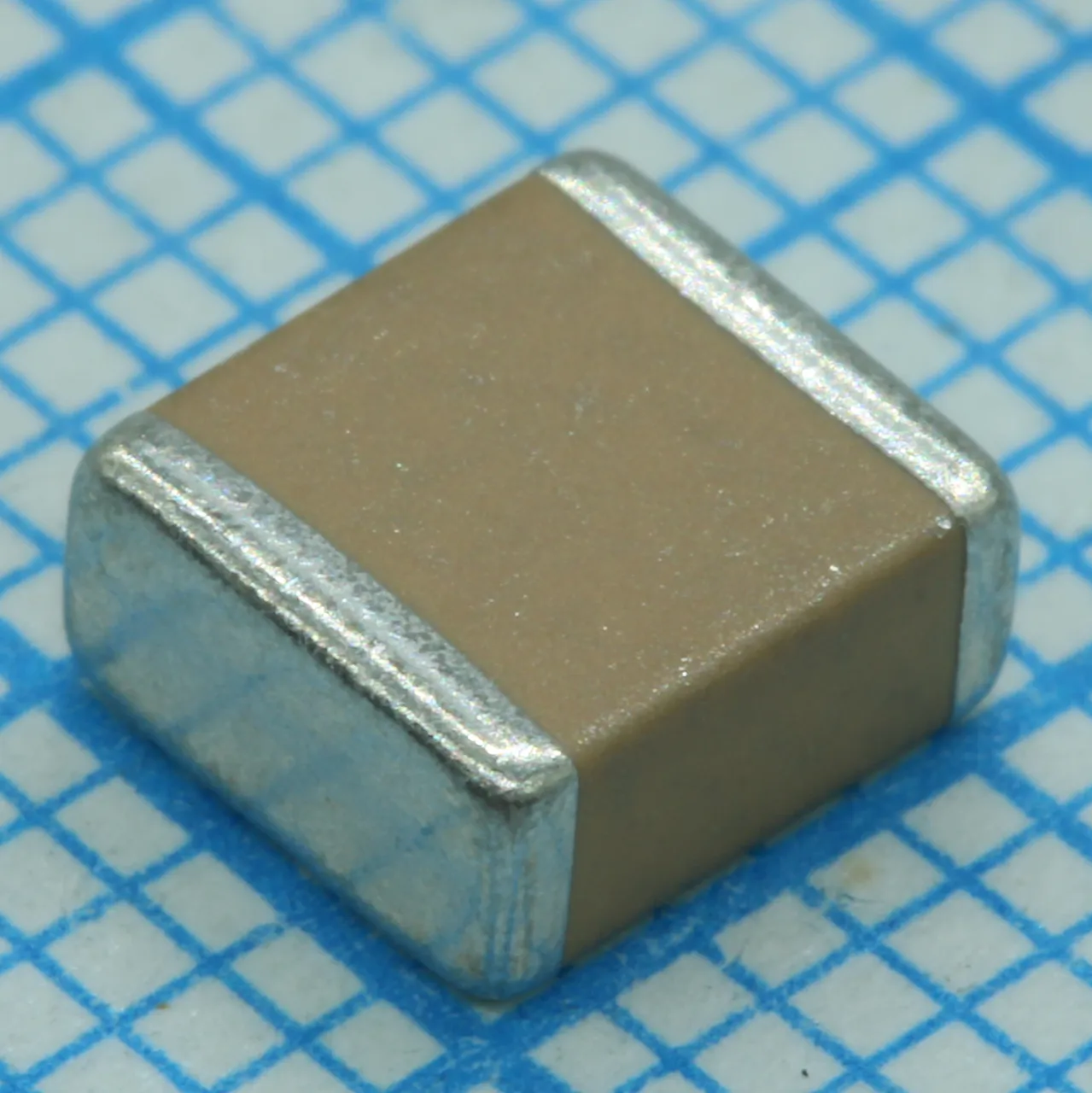 CKG57NX7R2A106M500JJ
